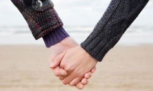 Couple holding hands